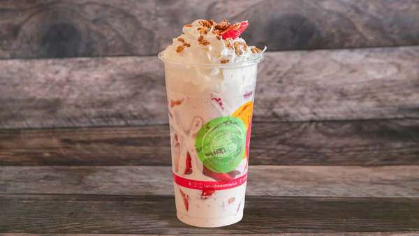 Fresh strawberries served with whipped cream, one of our favorites!