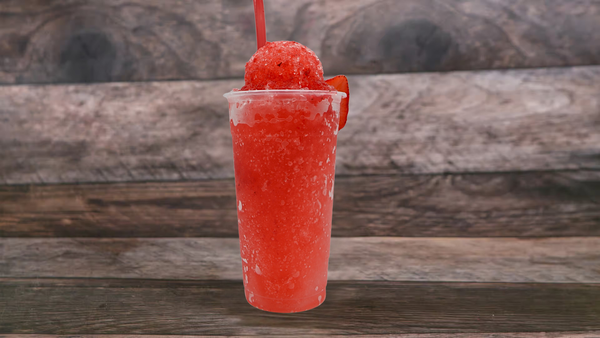 Shaved ice drink Snow cone with your choice of flavor.